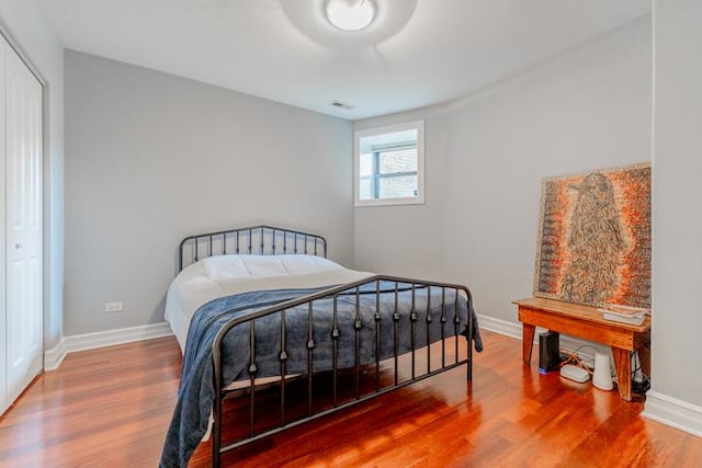4111 N Kenmore Ave Unit 1Ng, Chicago, IL 60613 - bedroom with wood finished floors, baseboards, and a closet