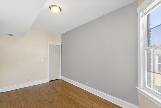 4130 W Potomac Ave, Chicago, IL 60651 - unfurnished room with baseboards and hardwood / wood-style floors