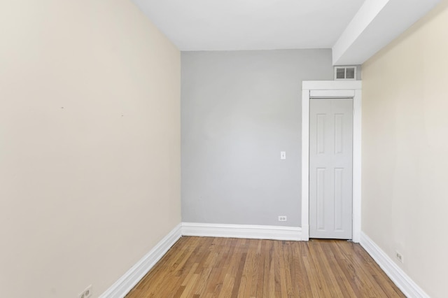 4130 W Potomac Ave, Chicago, IL 60651 - empty room with light wood finished floors and baseboards