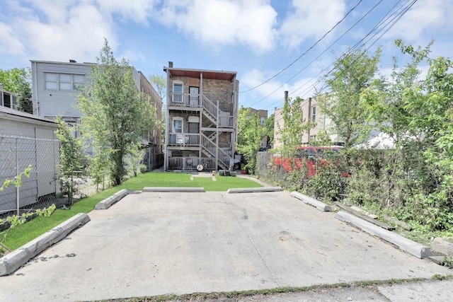 4130 W Potomac Ave, Chicago, IL 60651 - uncovered parking lot featuring stairway