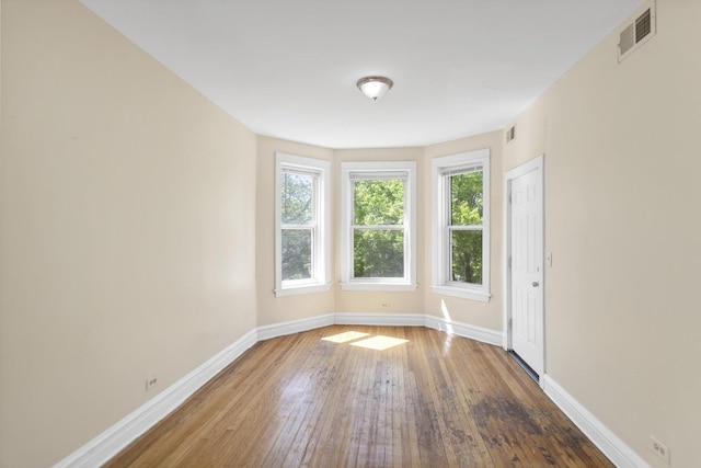 4130 W Potomac Ave, Chicago, IL 60651 - unfurnished room with hardwood / wood-style floors and baseboards