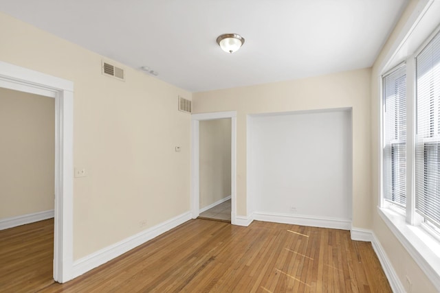 4130 W Potomac Ave, Chicago, IL 60651 - empty room featuring light wood-style floors and baseboards