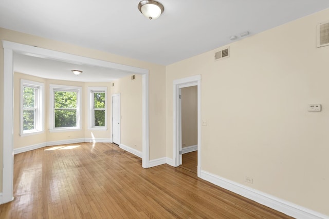 4130 W Potomac Ave, Chicago, IL 60651 - spare room with baseboards and light wood-type flooring