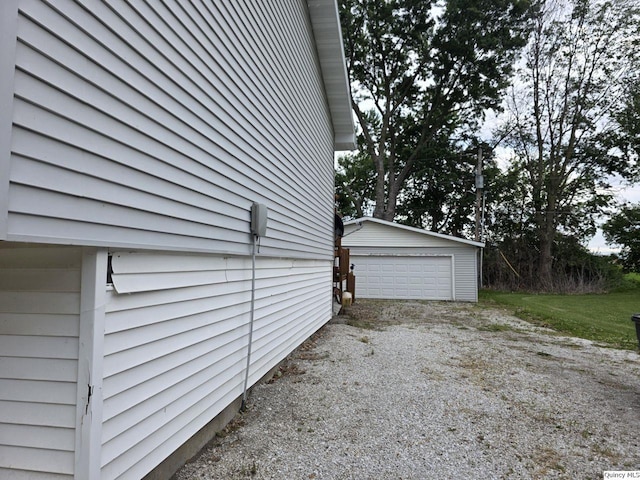 470 Alvord, Hamilton, IL 62341 - view of home's exterior featuring a garage and an outbuilding