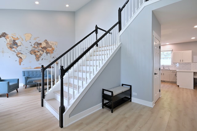 1422 Deer Creek Ln, Lake In The Hills, IL 60156 - stairway featuring wood finished floors, recessed lighting, and baseboards