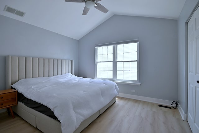 1422 Deer Creek Ln, Lake In The Hills, IL 60156 - bedroom featuring light wood-style flooring, vaulted ceiling, a closet, ceiling fan, and baseboards