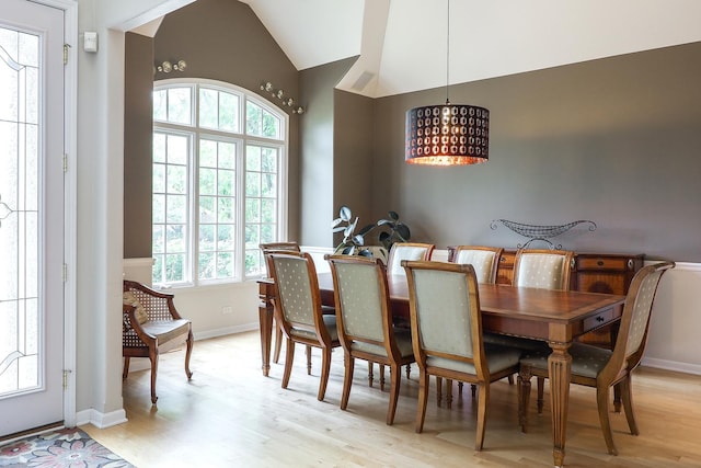 3536 Scottsdale Cir, Naperville, IL 60564 - dining space with a chandelier, light wood finished floors, and lofted ceiling