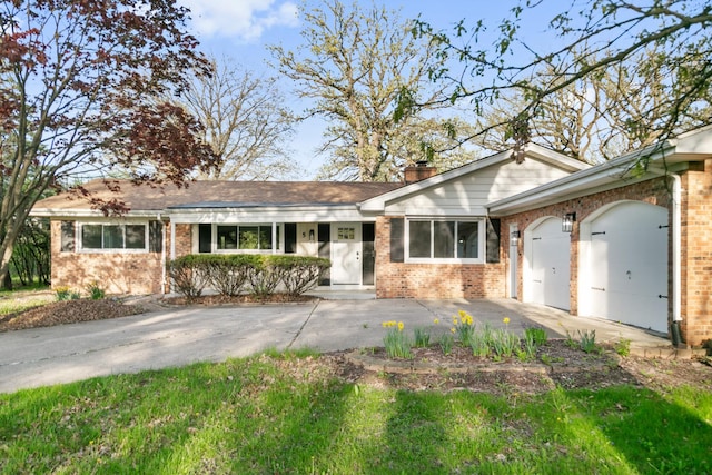 5 Danube Way, Olympia Fields, IL 60461 - single story home with brick siding, a garage, and driveway