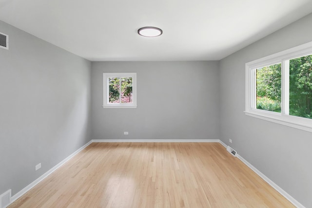 5 Danube Way, Olympia Fields, IL 60461 - spare room featuring light wood-style flooring and baseboards
