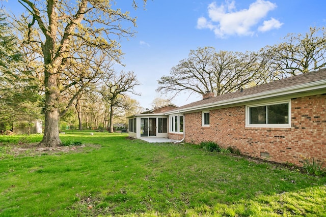 5 Danube Way, Olympia Fields, IL 60461 - view of grassy yard featuring a patio area and a sunroom