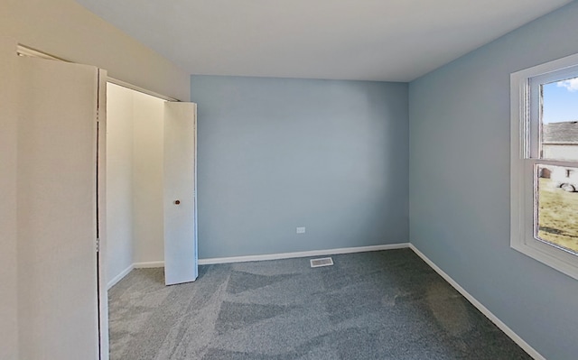 922 E 155th St, Phoenix, IL 60426 - unfurnished bedroom featuring carpet flooring and baseboards