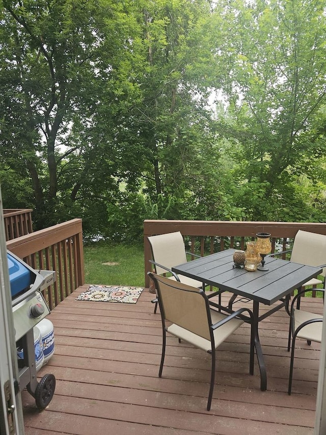 8314 Sierra Woods Ln, Carpentersville, IL 60110 - wooden terrace featuring outdoor dining space