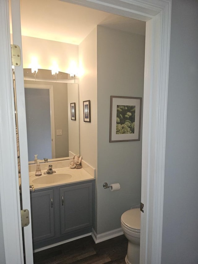 8314 Sierra Woods Ln, Carpentersville, IL 60110 - half bath with vanity and wood finished floors