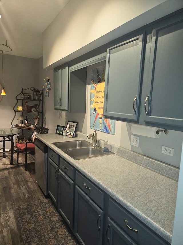 8314 Sierra Woods Ln, Carpentersville, IL 60110 - kitchen with dishwasher, dark wood finished floors, light countertops, and pendant lighting