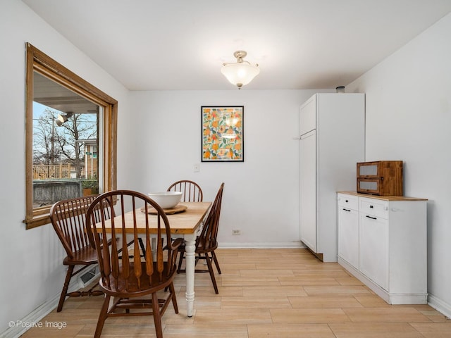 4048 W 105th St, Oak Lawn, IL 60453 - dining area with light wood-type flooring