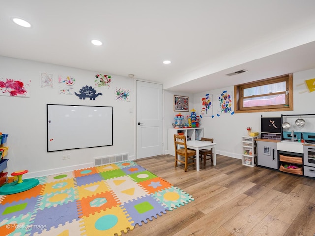 4048 W 105th St, Oak Lawn, IL 60453 - game room with light wood finished floors and recessed lighting