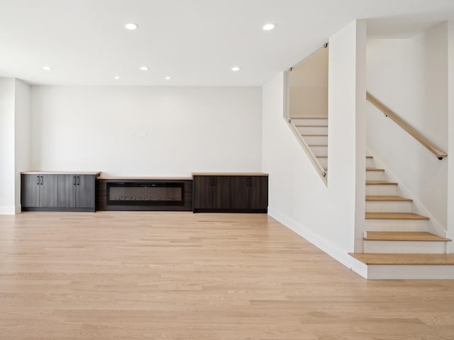 967 E 62nd St Unit 2, Chicago, IL 60637 - spare room featuring stairway, light wood-style flooring, recessed lighting, and baseboards