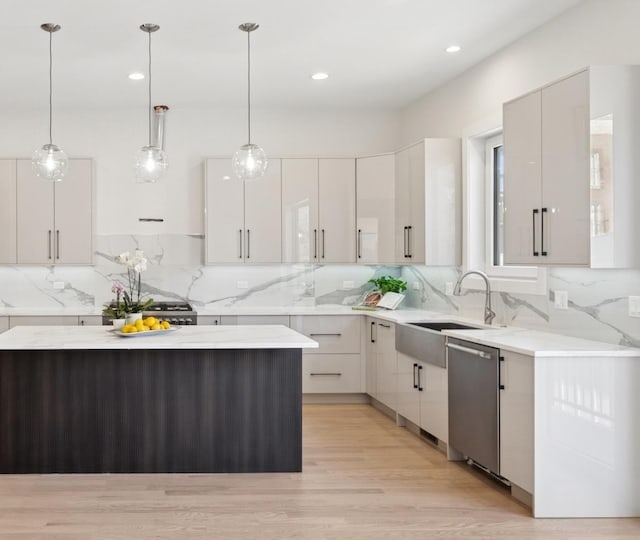 967 E 62nd St Unit 2, Chicago, IL 60637 - kitchen featuring dishwasher, backsplash, hanging light fixtures, light wood finished floors, and recessed lighting