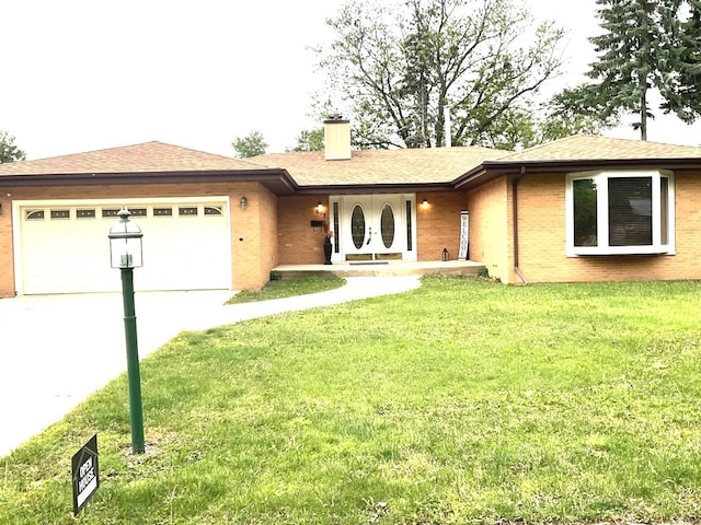 813 Junie Ct, Joliet, IL 60435 - single story home with brick siding, a chimney, concrete driveway, and a garage
