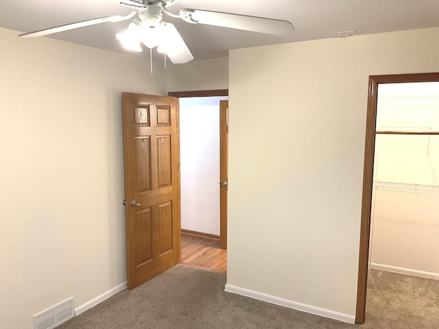813 Junie Ct, Joliet, IL 60435 - unfurnished room with carpet floors and ceiling fan