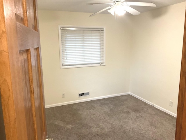 813 Junie Ct, Joliet, IL 60435 - spare room featuring a ceiling fan and dark colored carpet