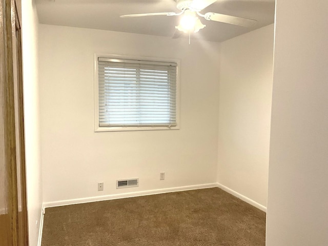 813 Junie Ct, Joliet, IL 60435 - empty room with dark carpet and ceiling fan