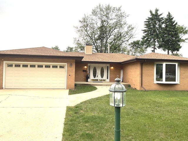813 Junie Ct, Joliet, IL 60435 - ranch-style home with driveway, brick siding, a front lawn, and an attached garage