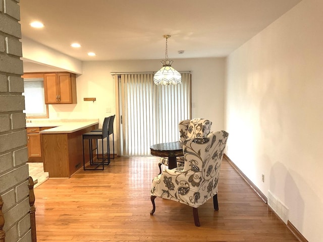 813 Junie Ct, Joliet, IL 60435 - sitting room with light wood-style flooring, a chandelier, and recessed lighting