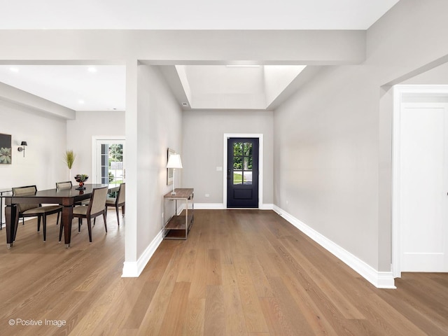 608 W 55th St, Hinsdale, IL 60521 - foyer with healthy amount of natural light, wood finished floors, baseboards, recessed lighting, and a tray ceiling