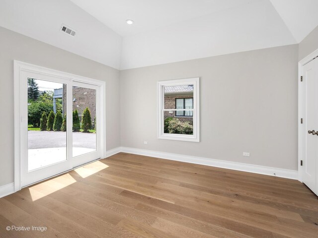 608 W 55th St, Hinsdale, IL 60521 - empty room featuring healthy amount of natural light, baseboards, light wood-style floors, and recessed lighting