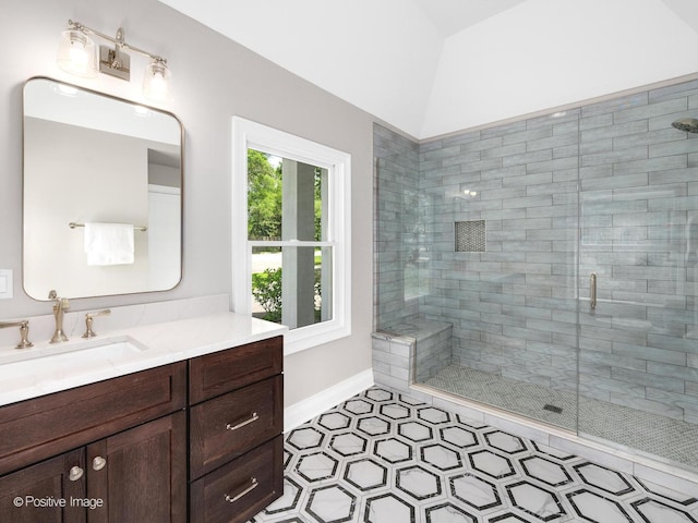 608 W 55th St, Hinsdale, IL 60521 - full bathroom featuring vanity, a shower stall, vaulted ceiling, and baseboards