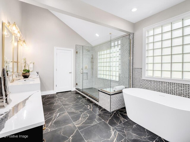 608 W 55th St, Hinsdale, IL 60521 - bathroom featuring double vanity, a stall shower, a freestanding bath, marble tiled floors, and lofted ceiling