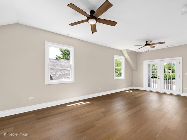 608 W 55th St, Hinsdale, IL 60521 - unfurnished room featuring a ceiling fan, french doors, wood finished floors, and baseboards