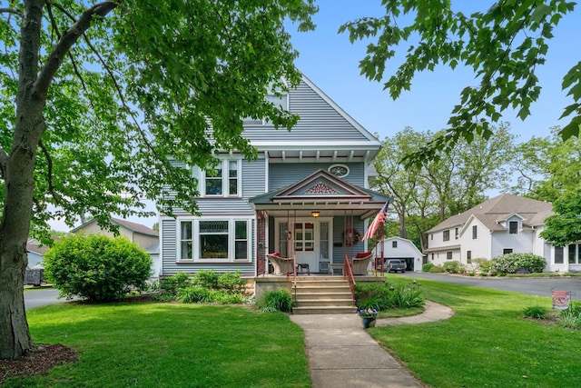 119 E 4th St, Sandwich, IL 60548 - victorian home featuring covered porch and a front yard