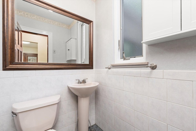 236 Country Club Rd, Chicago Heights, IL 60411 - half bathroom with toilet, tile walls, and a sink