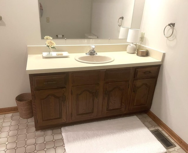 333 Monroe St, Oswego, IL 60543 - bathroom with vanity and tile patterned floors