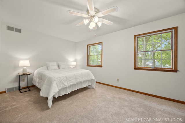333 Monroe St, Oswego, IL 60543 - carpeted bedroom featuring baseboards and ceiling fan