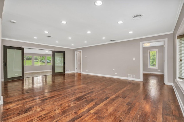 9109 W 123rd St, Palos Park, IL 60464 - empty room featuring plenty of natural light, wood finished floors, baseboards, ornamental molding, and recessed lighting