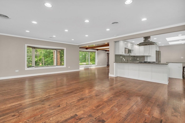 9109 W 123rd St, Palos Park, IL 60464 - unfurnished living room featuring ornamental molding, recessed lighting, dark wood-style floors, baseboards, and a sink