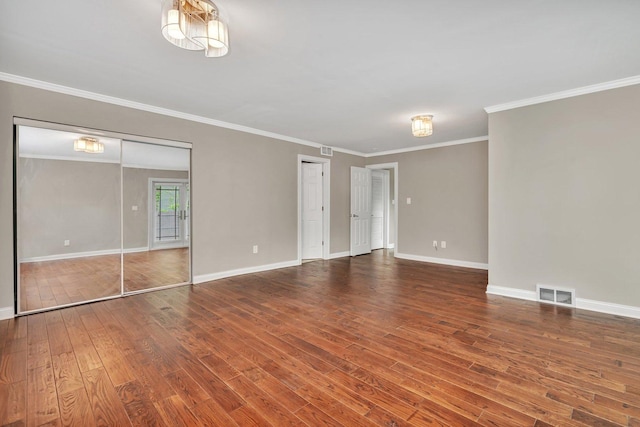 9109 W 123rd St, Palos Park, IL 60464 - spare room with wood finished floors, baseboards, and crown molding