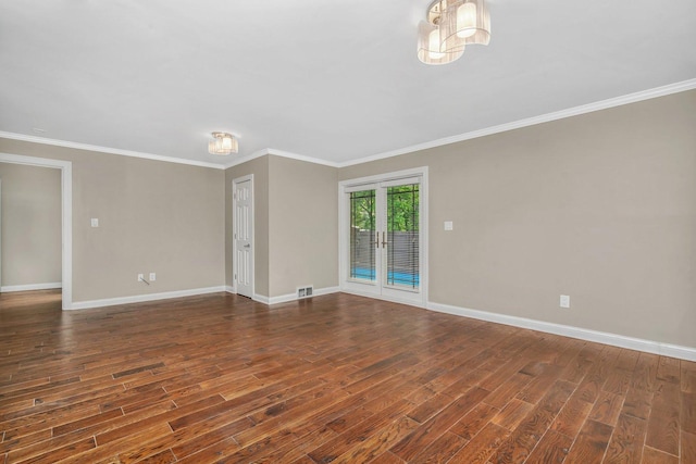 9109 W 123rd St, Palos Park, IL 60464 - spare room featuring dark wood-style flooring, baseboards, and ornamental molding