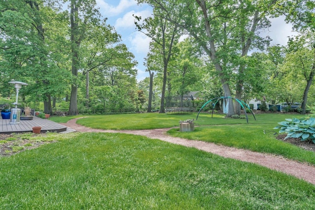 9109 W 123rd St, Palos Park, IL 60464 - view of yard featuring a trampoline and a deck