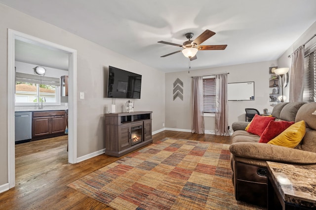 35 Lynwood Dr, Morris, IL 60450 - living room with ceiling fan, wood finished floors, baseboards, and a glass covered fireplace