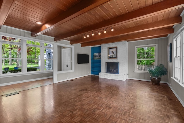 710 Longwood Dr, Lake Forest, IL 60045 - unfurnished living room featuring wooden ceiling with exposed beams, baseboards, and a brick fireplace