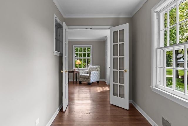 710 Longwood Dr, Lake Forest, IL 60045 - hall featuring dark wood-style floors, ornamental molding, and baseboards