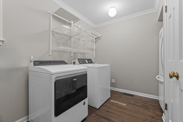 710 Longwood Dr, Lake Forest, IL 60045 - laundry area with separate washer and dryer, dark wood-style floors, crown molding, and baseboards
