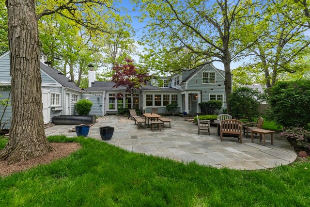 710 Longwood Dr, Lake Forest, IL 60045 - back of property featuring a patio