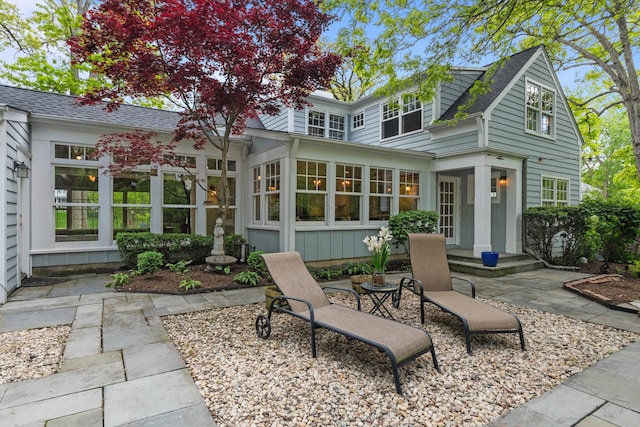 710 Longwood Dr, Lake Forest, IL 60045 - back of house featuring a patio and roof with shingles