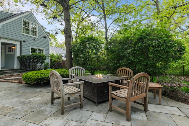 710 Longwood Dr, Lake Forest, IL 60045 - view of patio with an outdoor fire pit