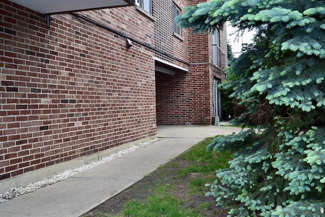 10241 Central Ave Unit 1B, Oak Lawn, IL 60453 - view of side of property featuring brick siding